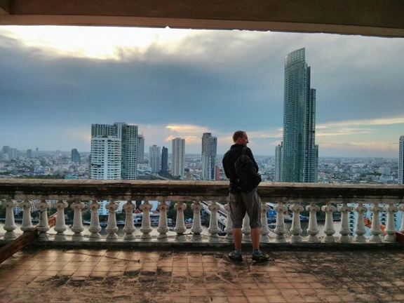 Looking out from the Sathorn Unique abandoned skyscraper in Bangkok