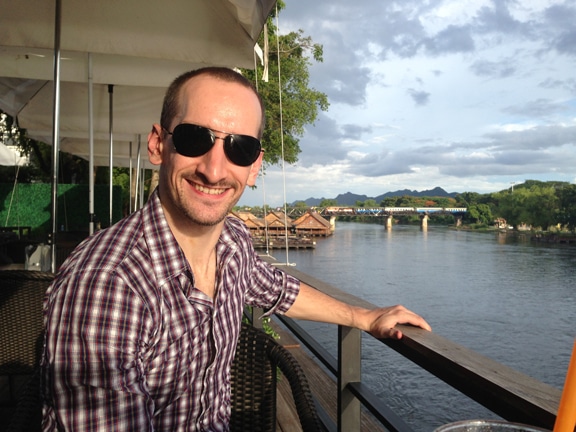 Dinner with a view of the bridge over the River Kwai. Kanchanaburi, Thailand.
