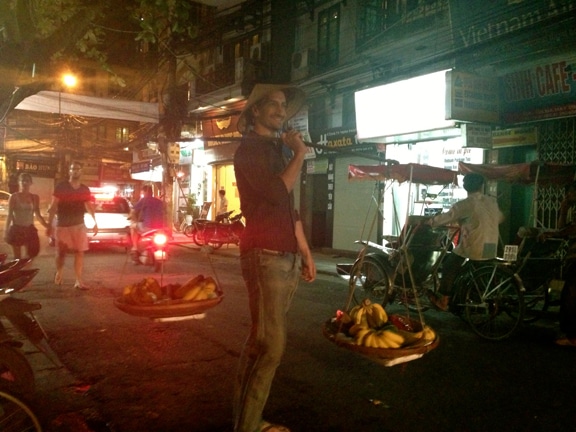 Selling bananas Vietnamese style my first night in Hanoi.